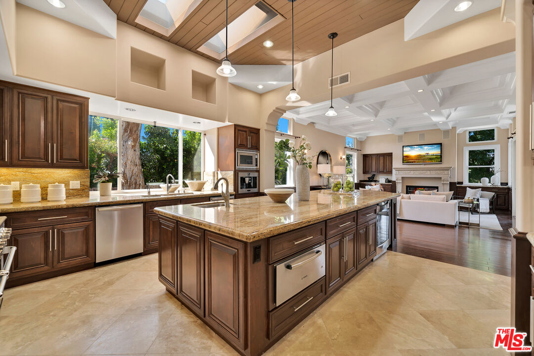 19261 Wells Drive Tarzana, CA 91356 - Photo 33 of 51 a kitchen with lots of counter top space