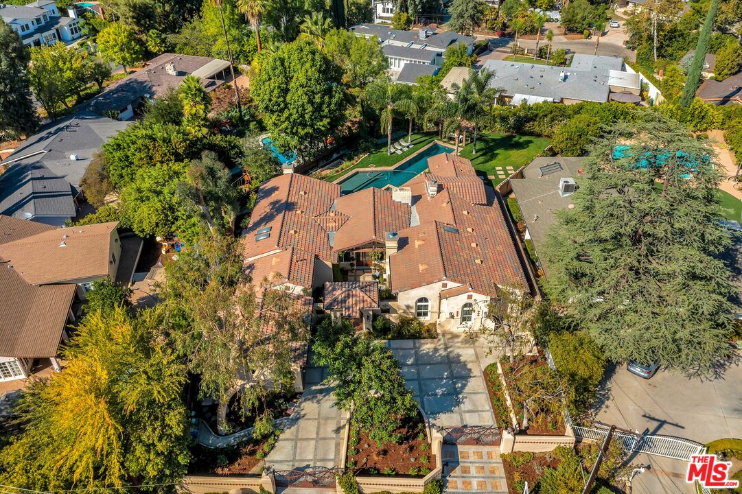 19261 Wells Drive Tarzana, CA 91356 - Photo 51 of 51 an aerial view of residential houses with outdoor space
