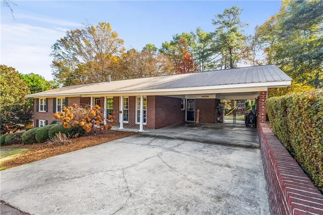 a view of a house that has a patio