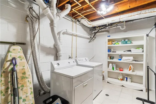 a utility room with washer and dryer