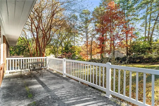 a view of a wooden fence