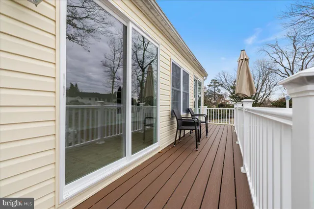 a balcony with view of outdoor space