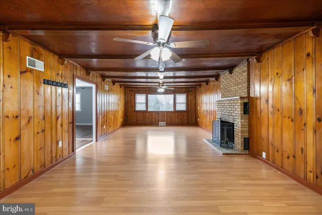 a view of gallery with wooden floor