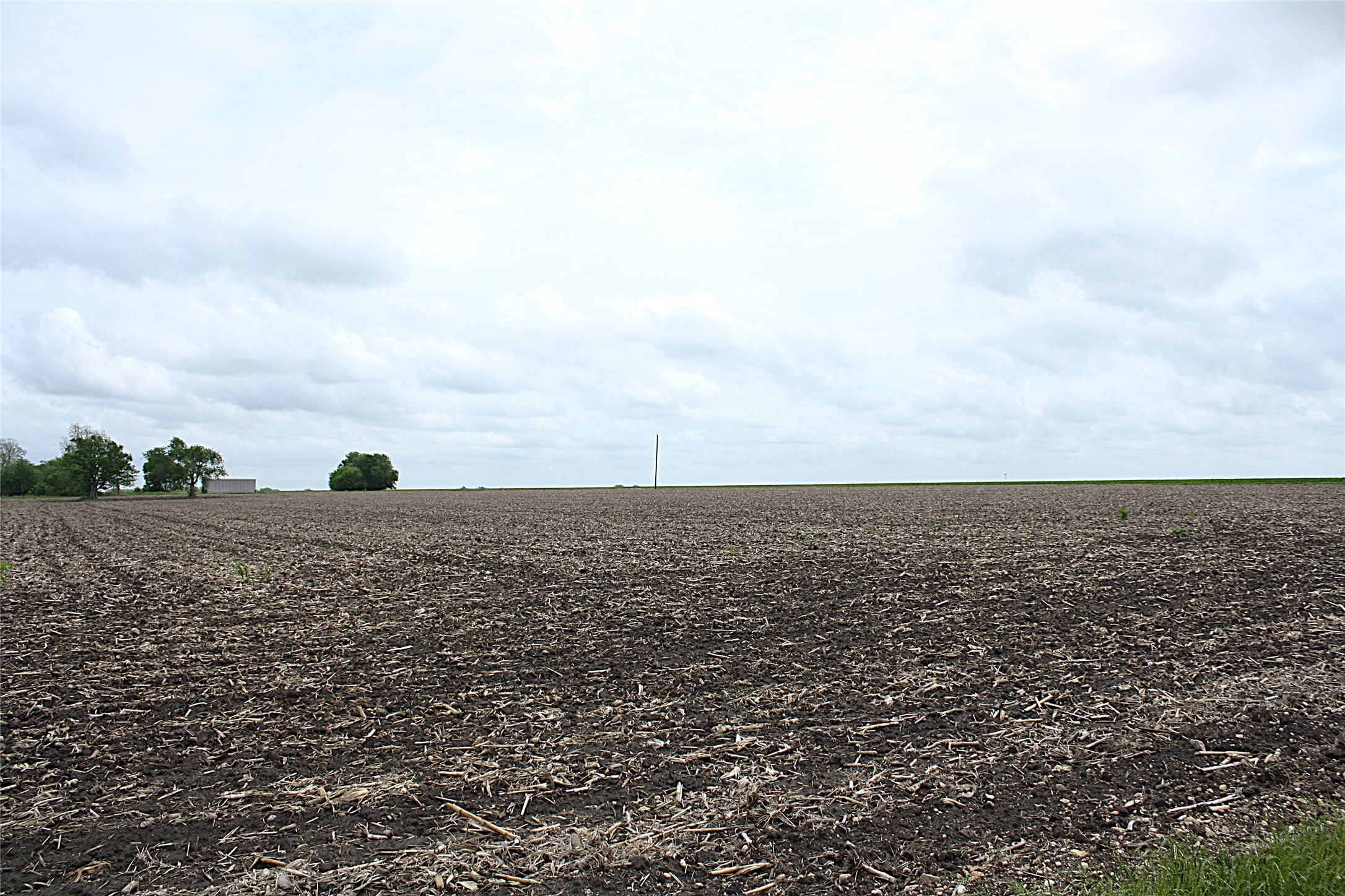 19374 Pennington Branch Road Holland, TX 76534 - Photo 18 of 24 Expansive agricultural land featuring tilled soil and a clear horizon