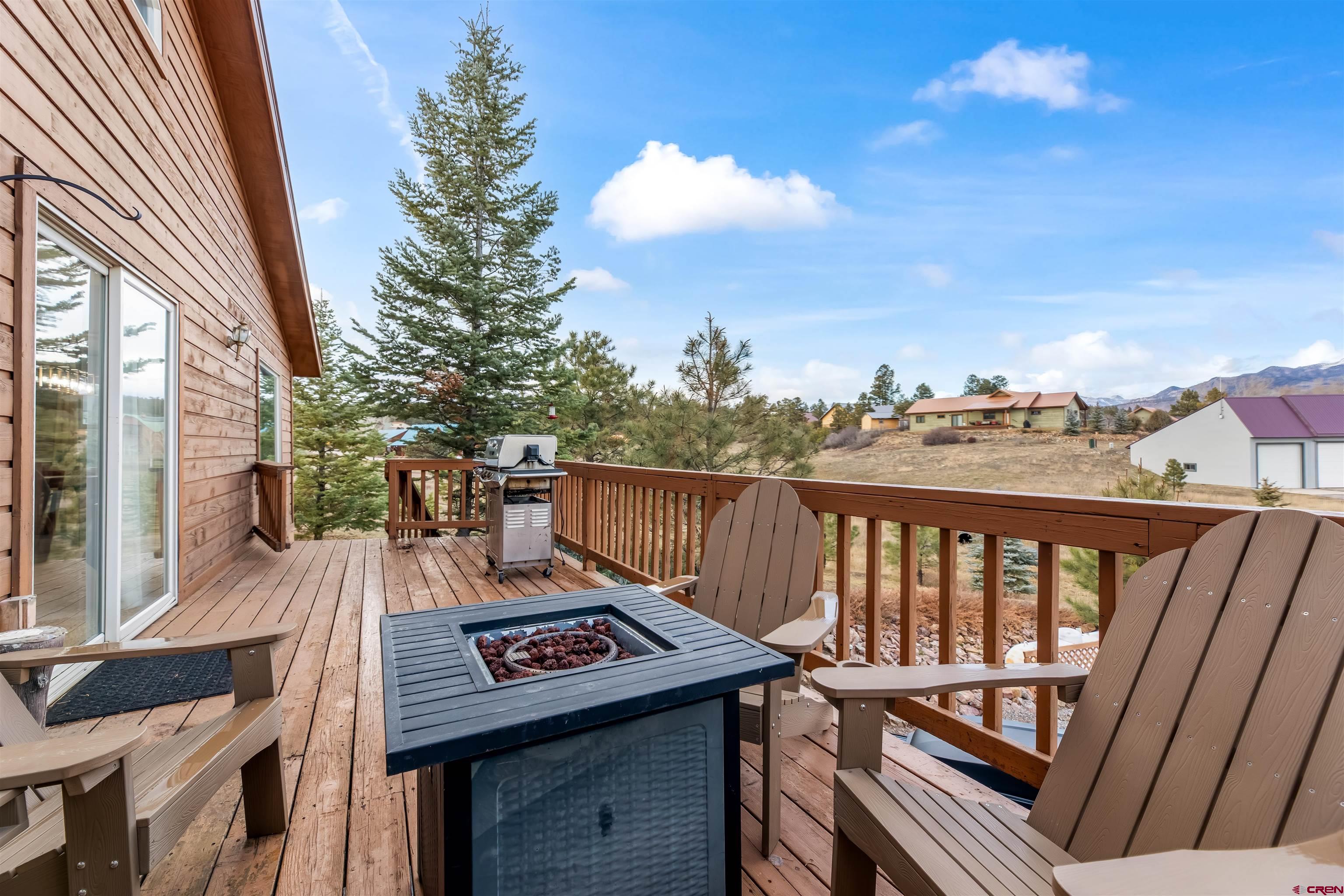 39 Hawk Place Pagosa Springs, CO 81147 - Photo 22 of 37 a view of a balcony with wooden floor and outdoor space