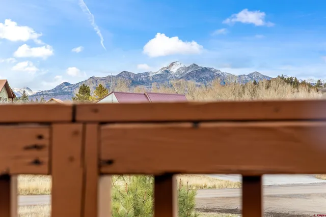 a view of a lake from a balcony