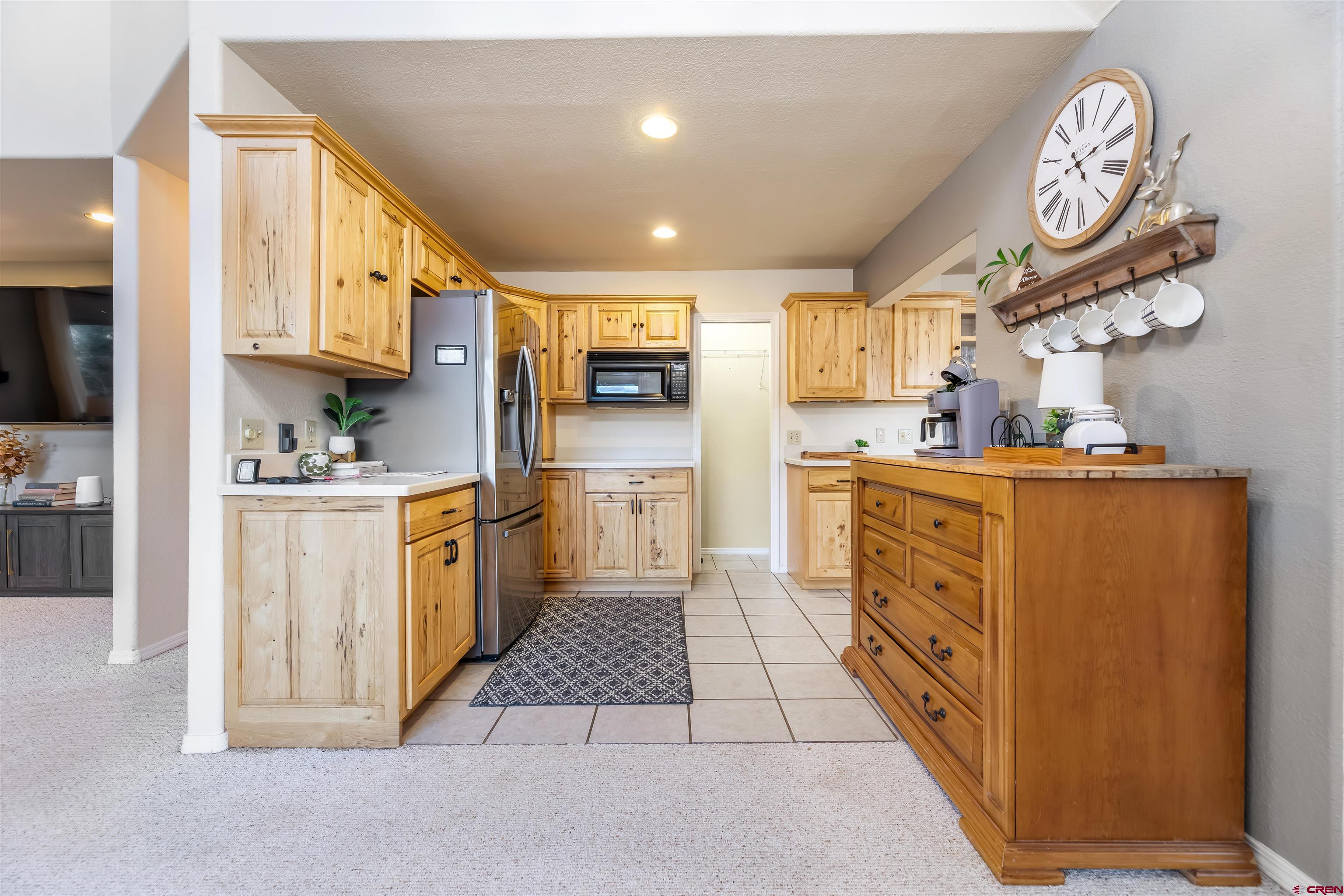 39 Hawk Place Pagosa Springs, CO 81147 - Photo 6 of 37 a kitchen with cabinets and a stove