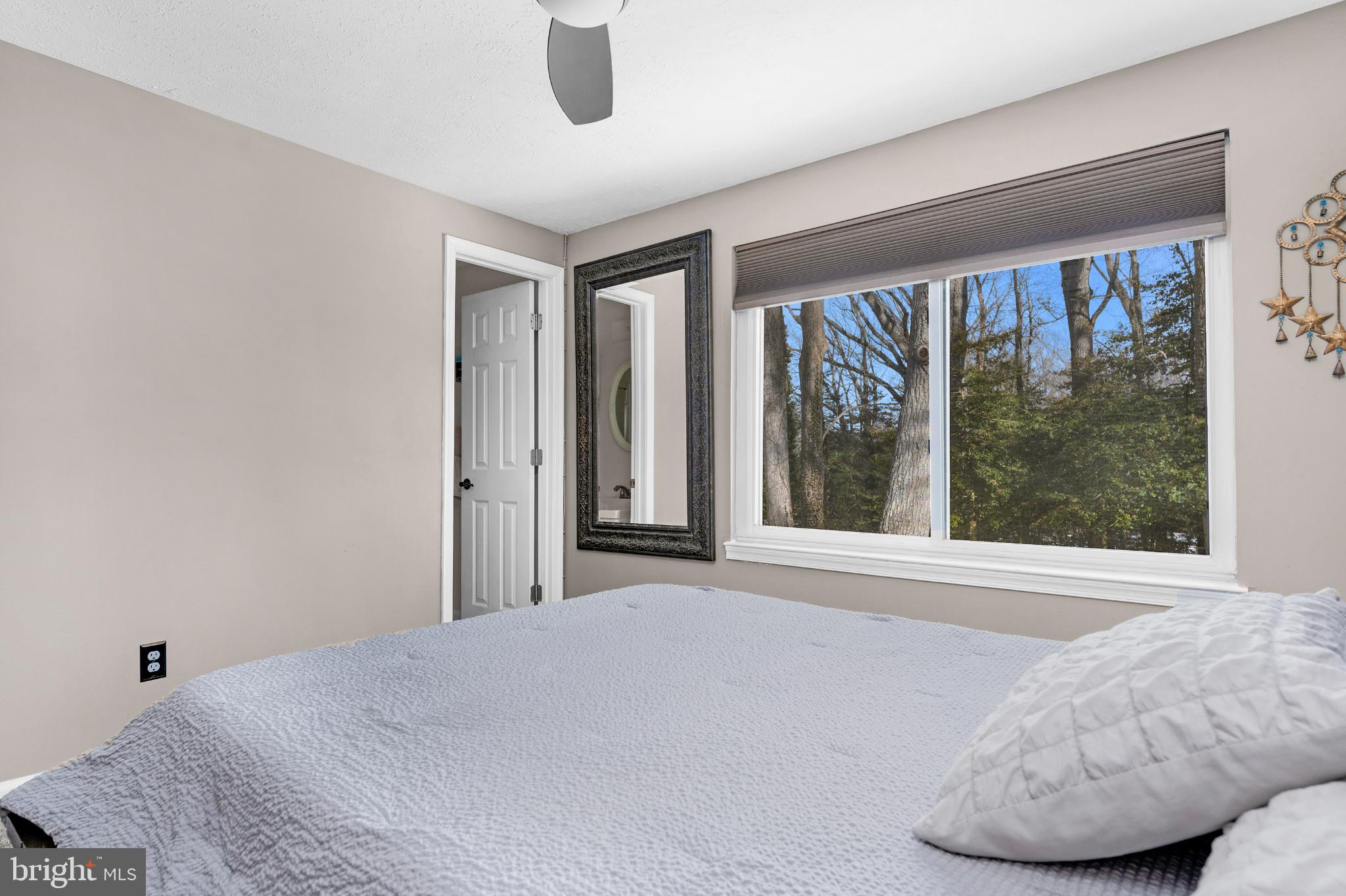 1688 Secretariat Drive Annapolis, MD 21409 - Photo 11 of 20 a bed room with a bed and a large window