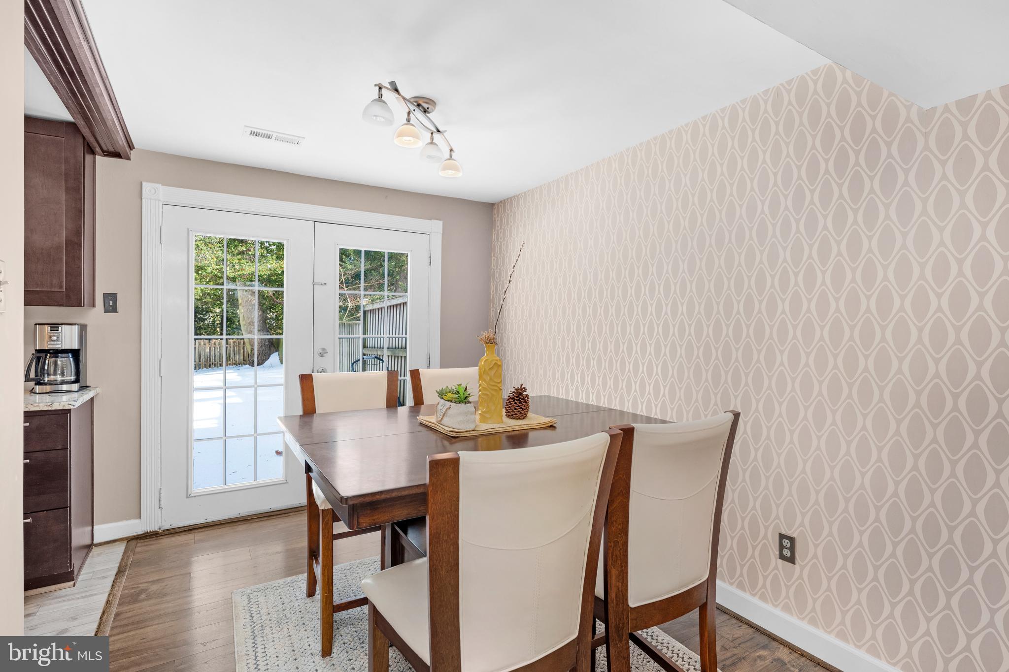 1688 Secretariat Drive Annapolis, MD 21409 - Photo 5 of 20 a view of a dining room with furniture window and outside view