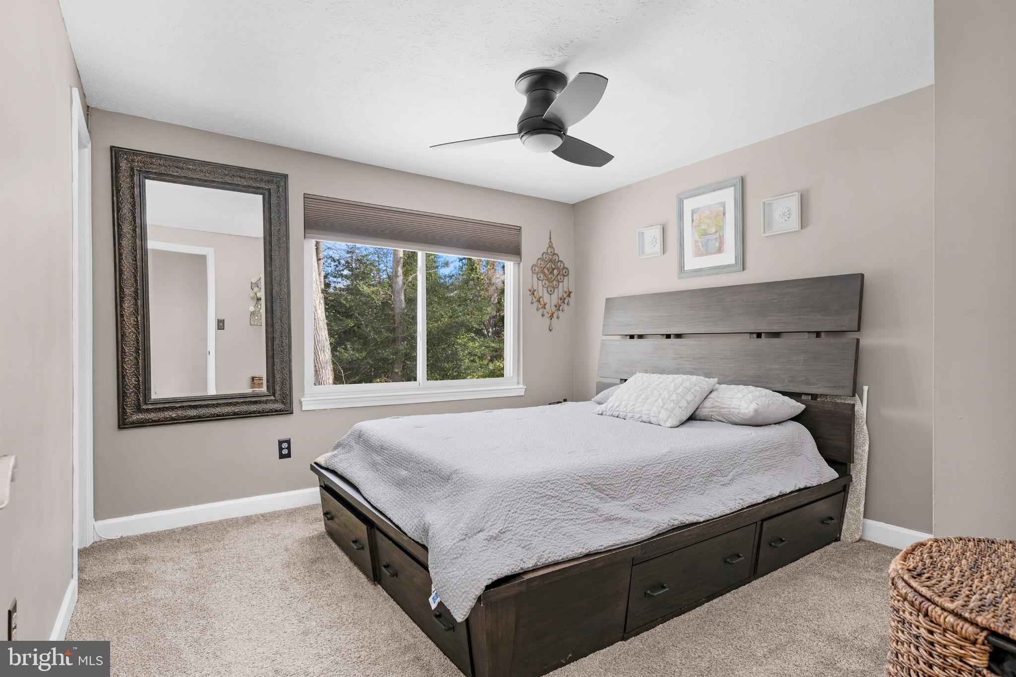 1688 Secretariat Drive Annapolis, MD 21409 - Photo 10 of 20 a bedroom with a large bed and a window