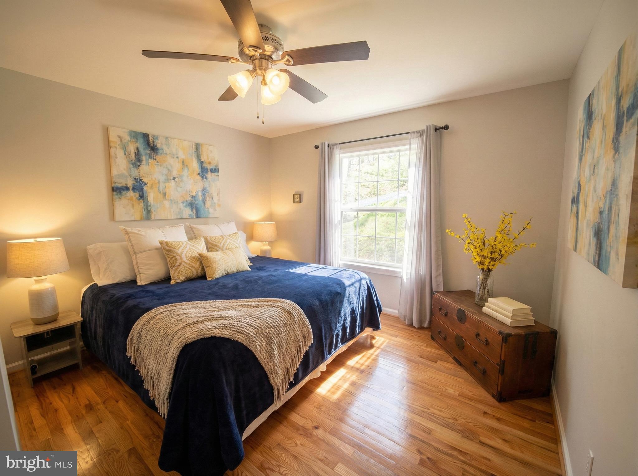 397 Parkside Road Linden, VA 22642 - Photo 22 of 32 a spacious bedroom with a bed and a window