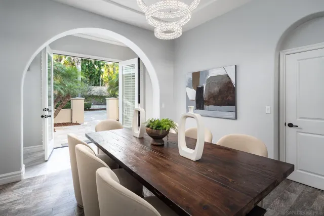 a kitchen with a table and chairs