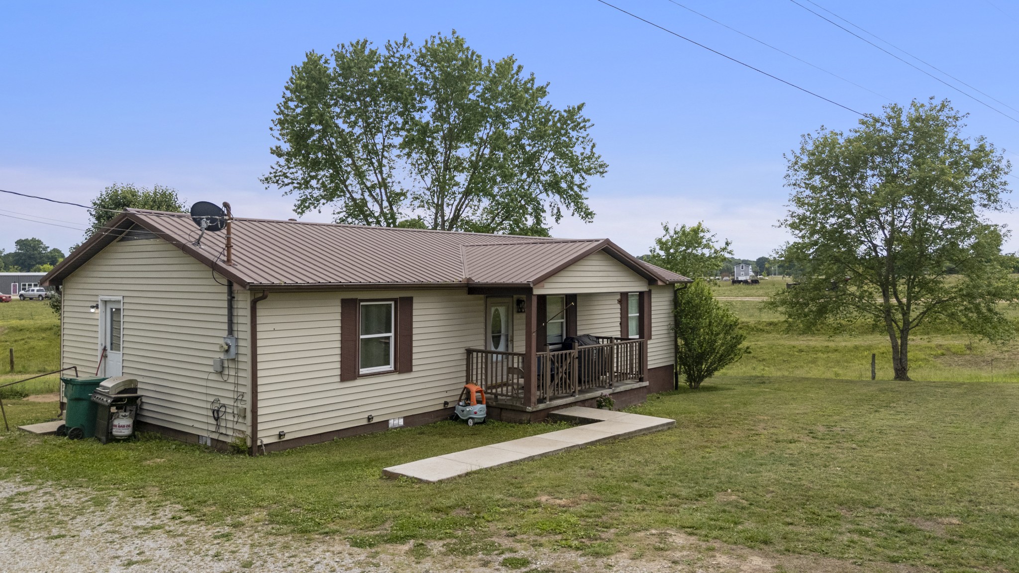421 Shady Grove Road Flintville, TN 37335 - Photo 27 of 33 a view of a house with a yard