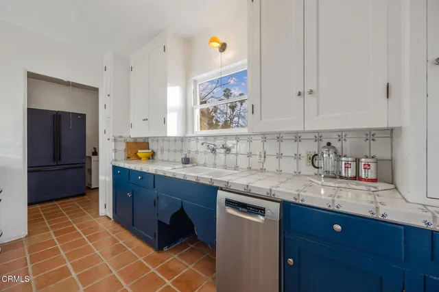 a room with furniture and a window