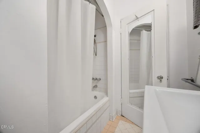 a view of balcony with wooden floor and outdoor seating