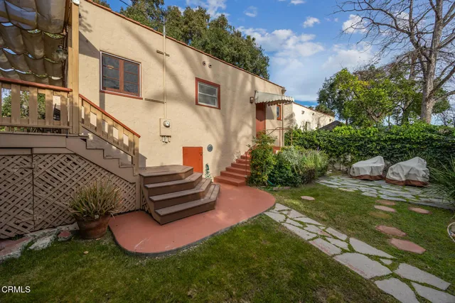 a view of a room with a black and white checkered floor