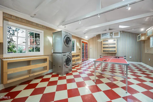 front view of a house with a garden