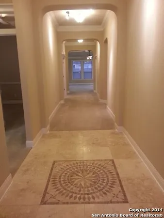 view of hallway with a window