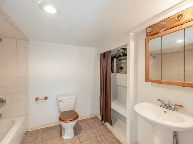 a bathroom with a sink and a toilet