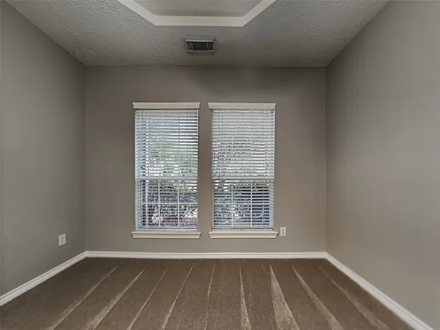 an empty room with window
