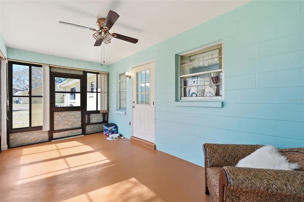 8556 Southwest 90th Lane, Unit F Ocala, FL 34481 - Photo 23 of 34 a bedroom with a bed and a window