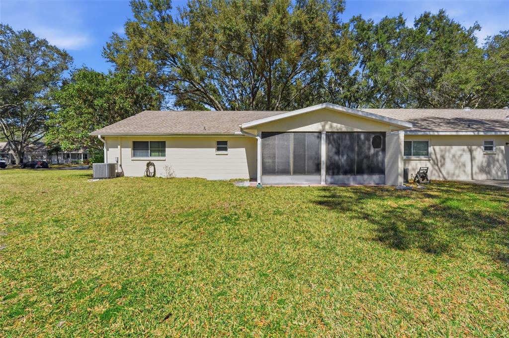 8556 Southwest 90th Lane, Unit F Ocala, FL 34481 - Photo 32 of 34 a house view with a garden space