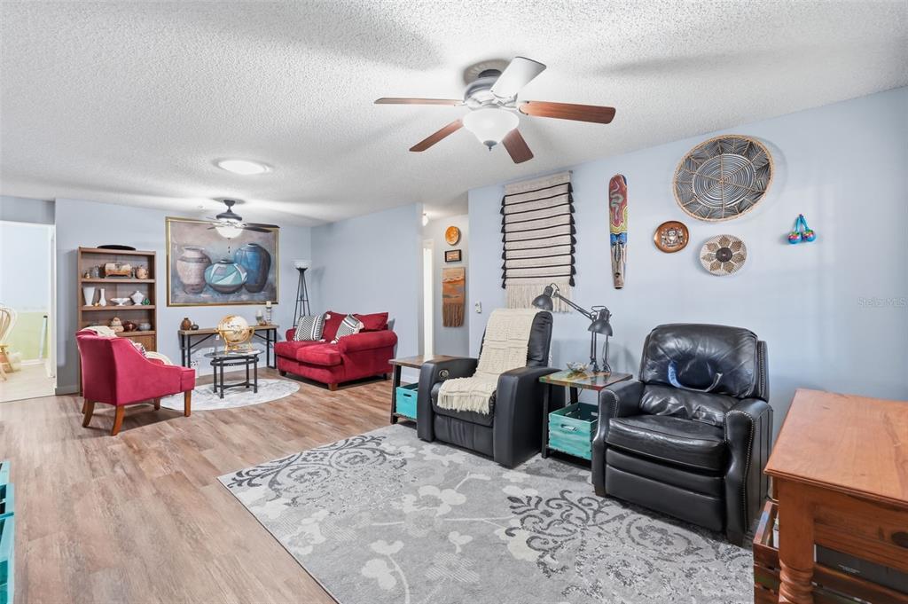 8556 Southwest 90th Lane, Unit F Ocala, FL 34481 - Photo 7 of 34 a living room with furniture