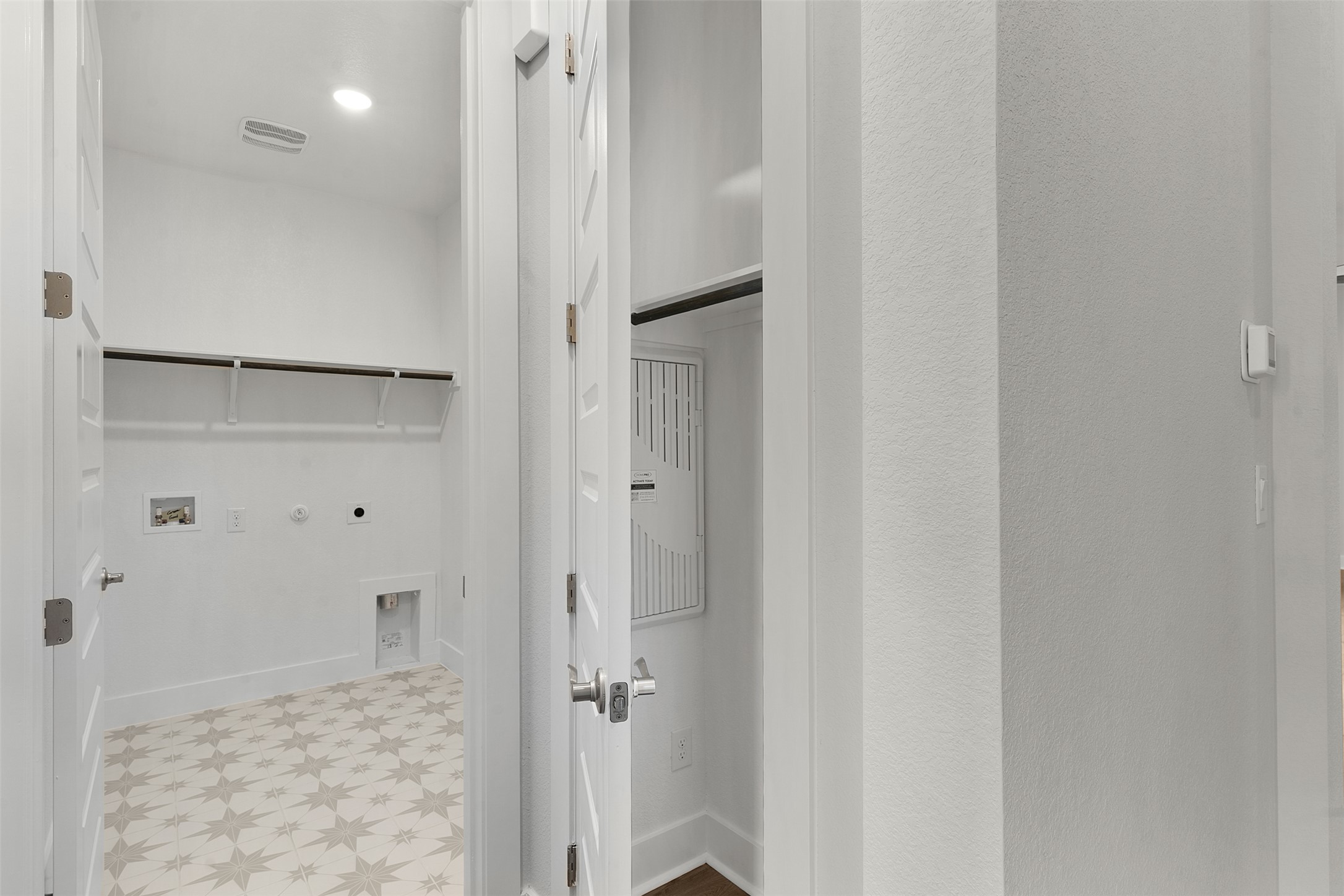 1129 Pansy Trail Georgetown, TX 78628 - Photo 6 of 29 Laundry room featuring a patterned floor, overhead shelving, recessed lighting, and wall connections for appliances