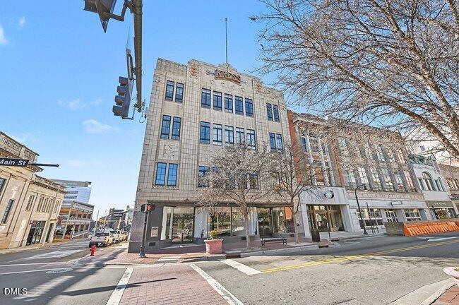 103 West Main Street, Unit 305 Durham, NC 27701 - Photo 23 of 25 a front view of a building with street