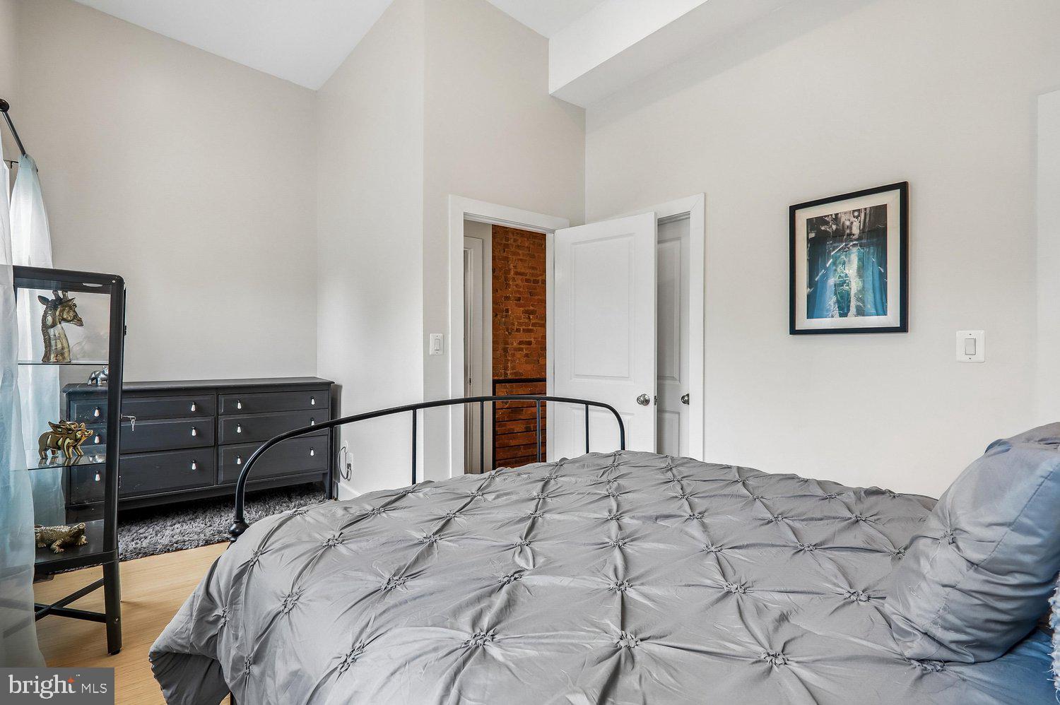 911 L Street Northeast Washington, DC 20002 - Photo 29 of 48 a bedroom with a bed and a closet