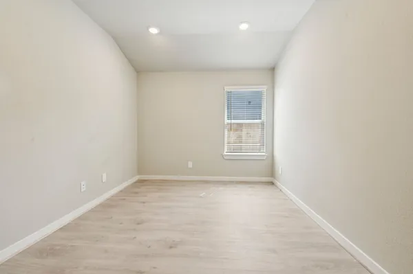 an empty room with windows