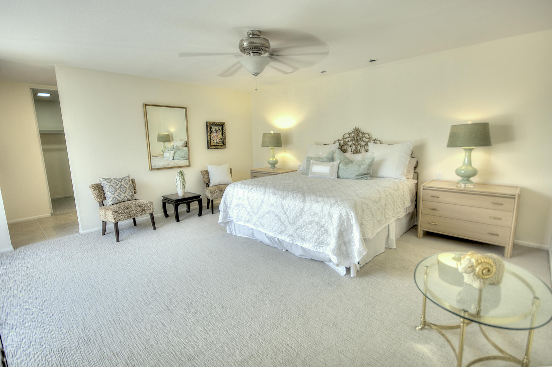 45730 Hopi Road Indian Wells, CA 92210 - Photo 12 of 42 a bedroom with bed and a chair