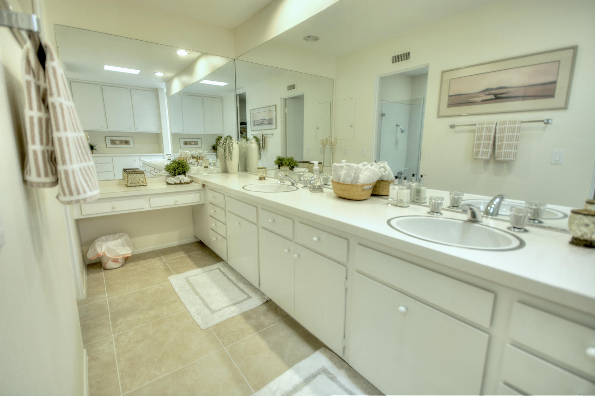 45730 Hopi Road Indian Wells, CA 92210 - Photo 15 of 42 a bathroom with a sink double vanity granite tub shower and a mirror