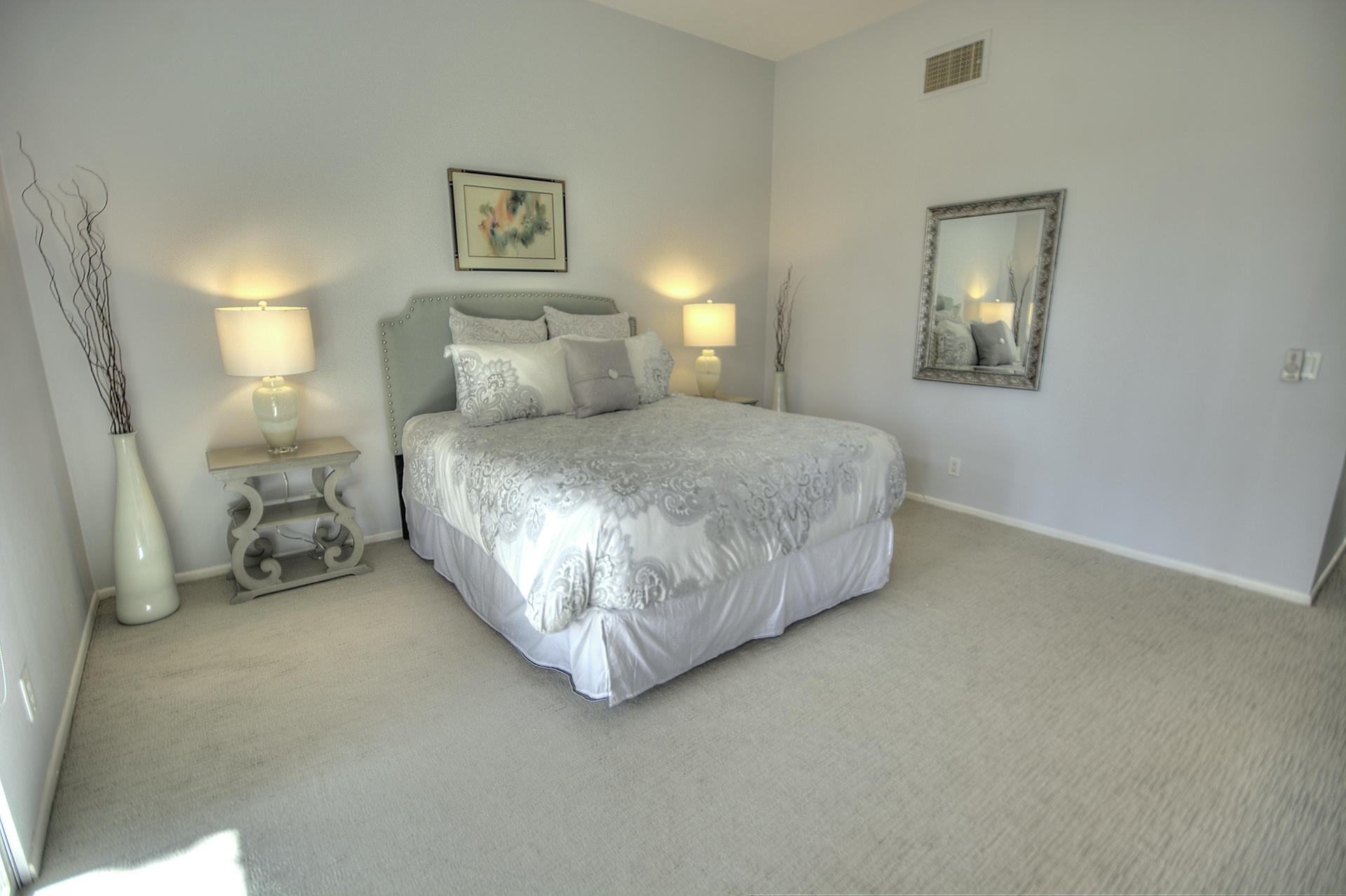 45730 Hopi Road Indian Wells, CA 92210 - Photo 18 of 42 a bedroom with a bed and a night stand