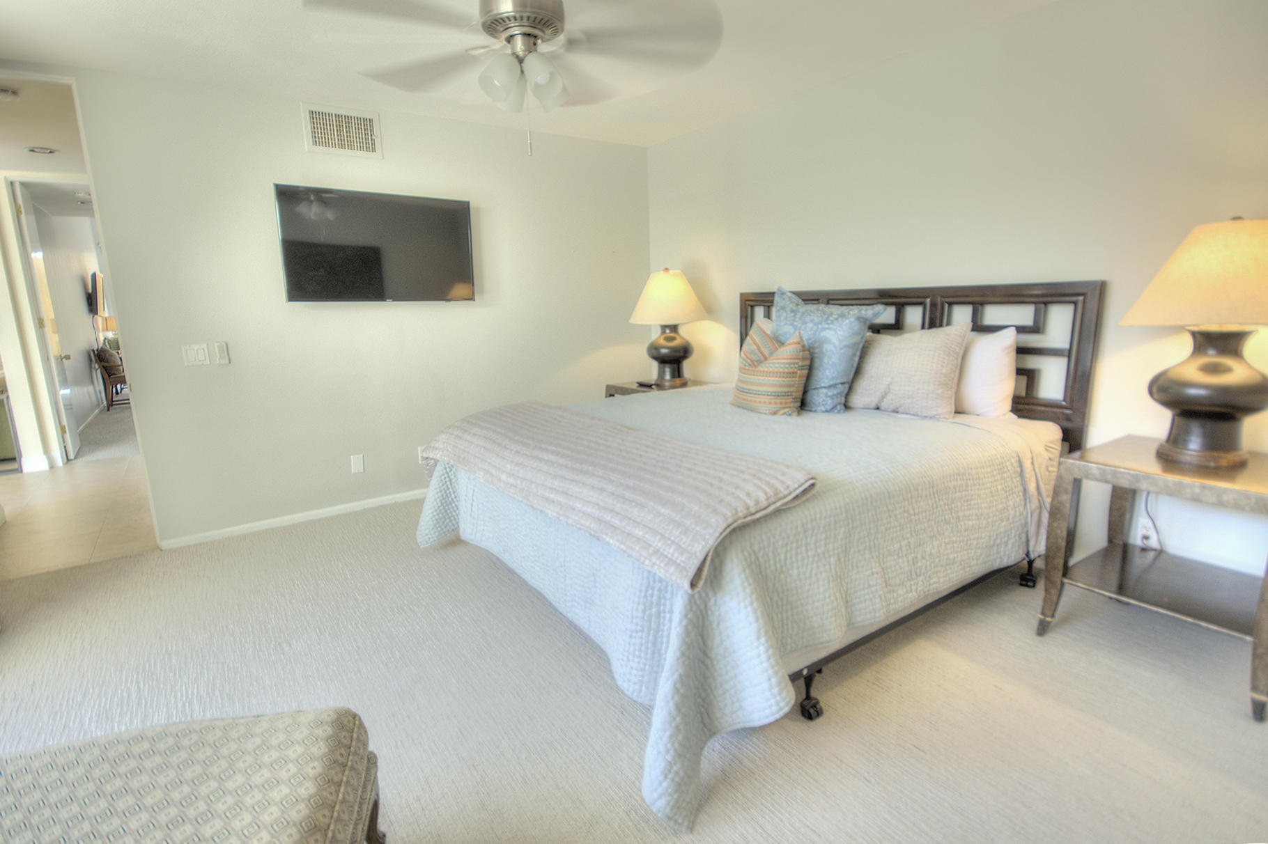 45730 Hopi Road Indian Wells, CA 92210 - Photo 23 of 42 a bedroom with a bed and a flat screen tv