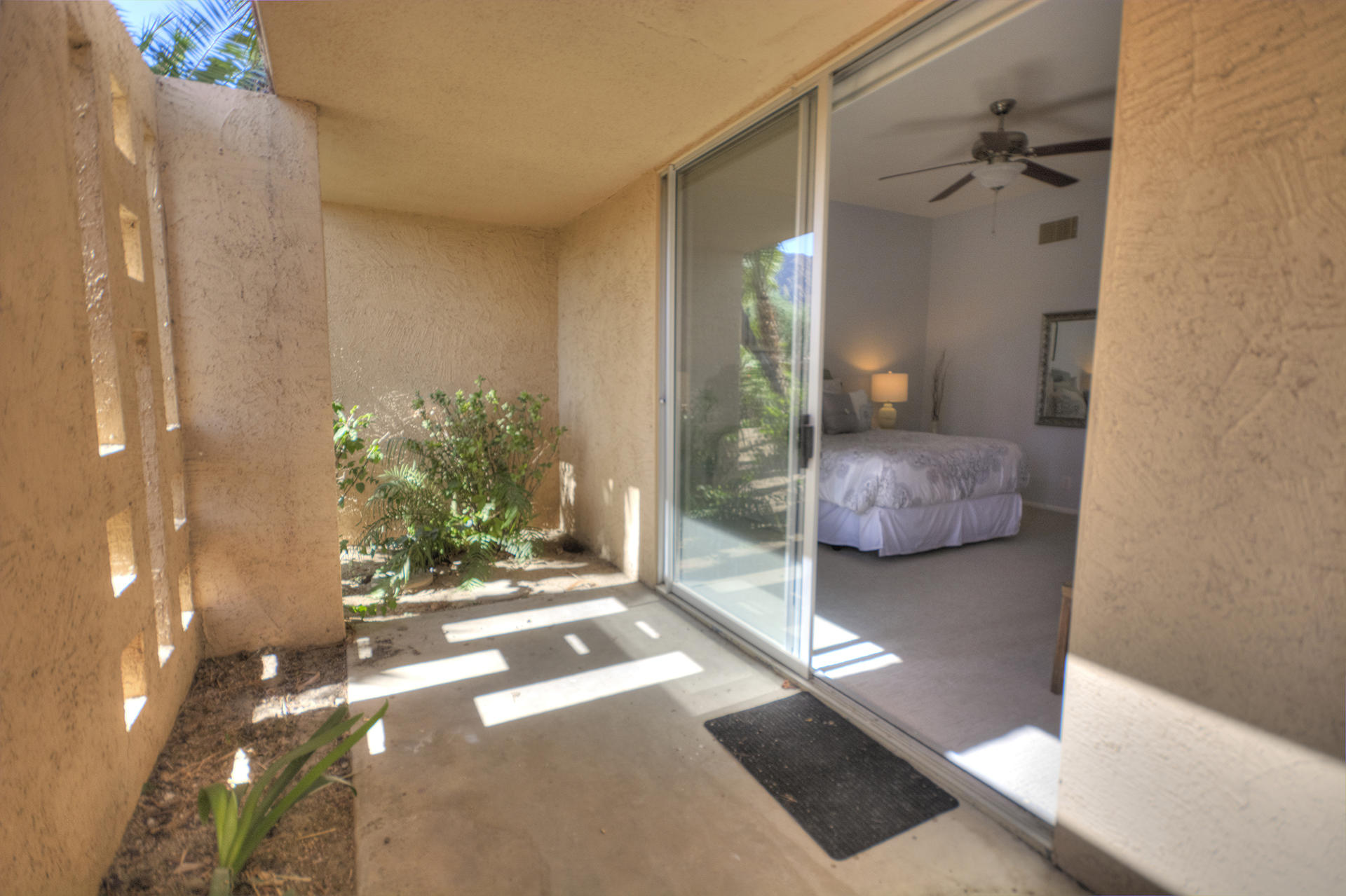 45730 Hopi Road Indian Wells, CA 92210 - Photo 25 of 42 a living room with furniture and a chandelier