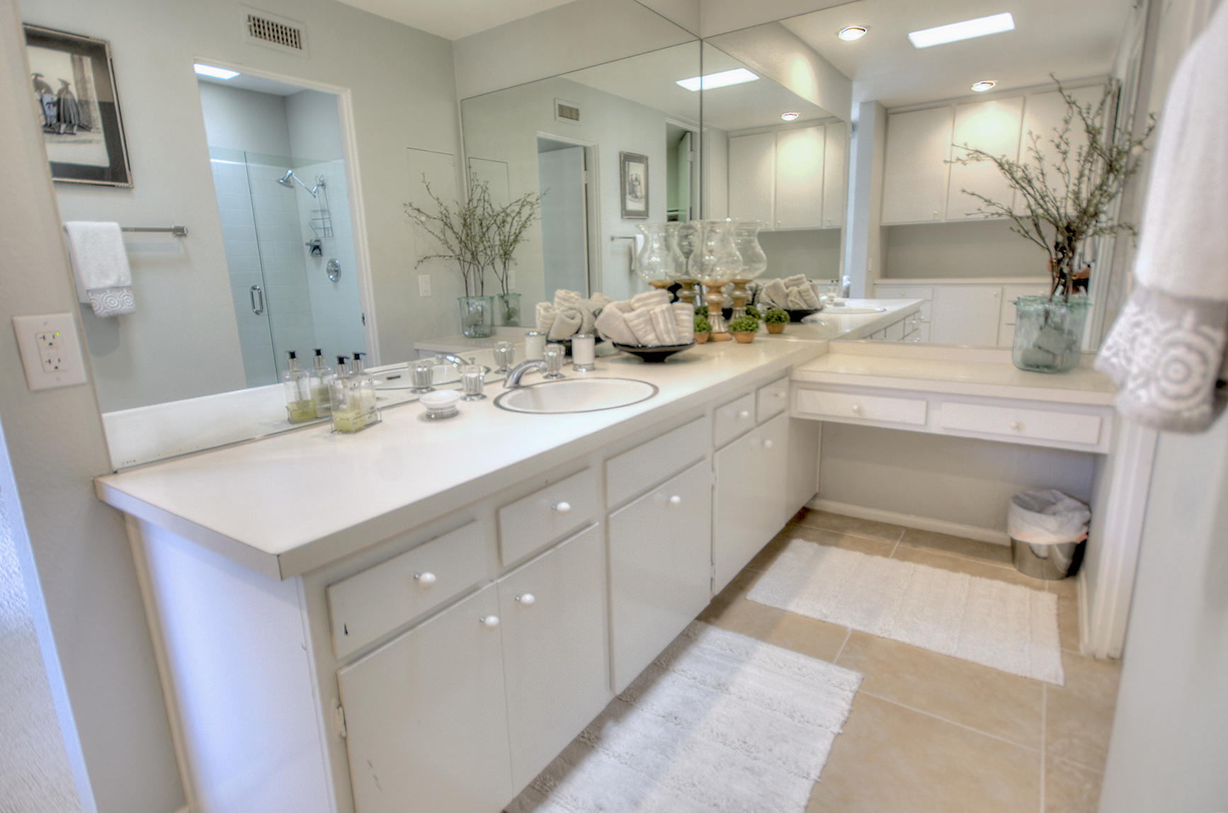 45730 Hopi Road Indian Wells, CA 92210 - Photo 26 of 42 a bathroom with a sink double vanity granite and a mirror