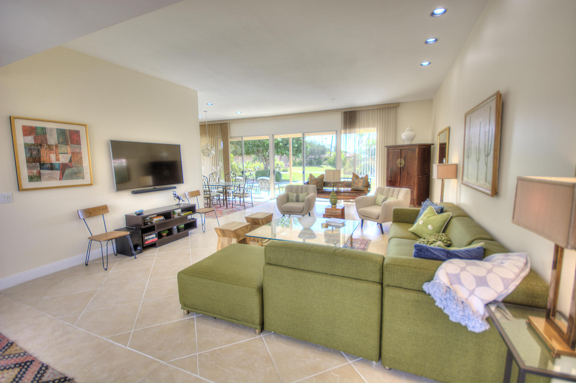 45730 Hopi Road Indian Wells, CA 92210 - Photo 5 of 42 a living room with furniture and a flat screen tv
