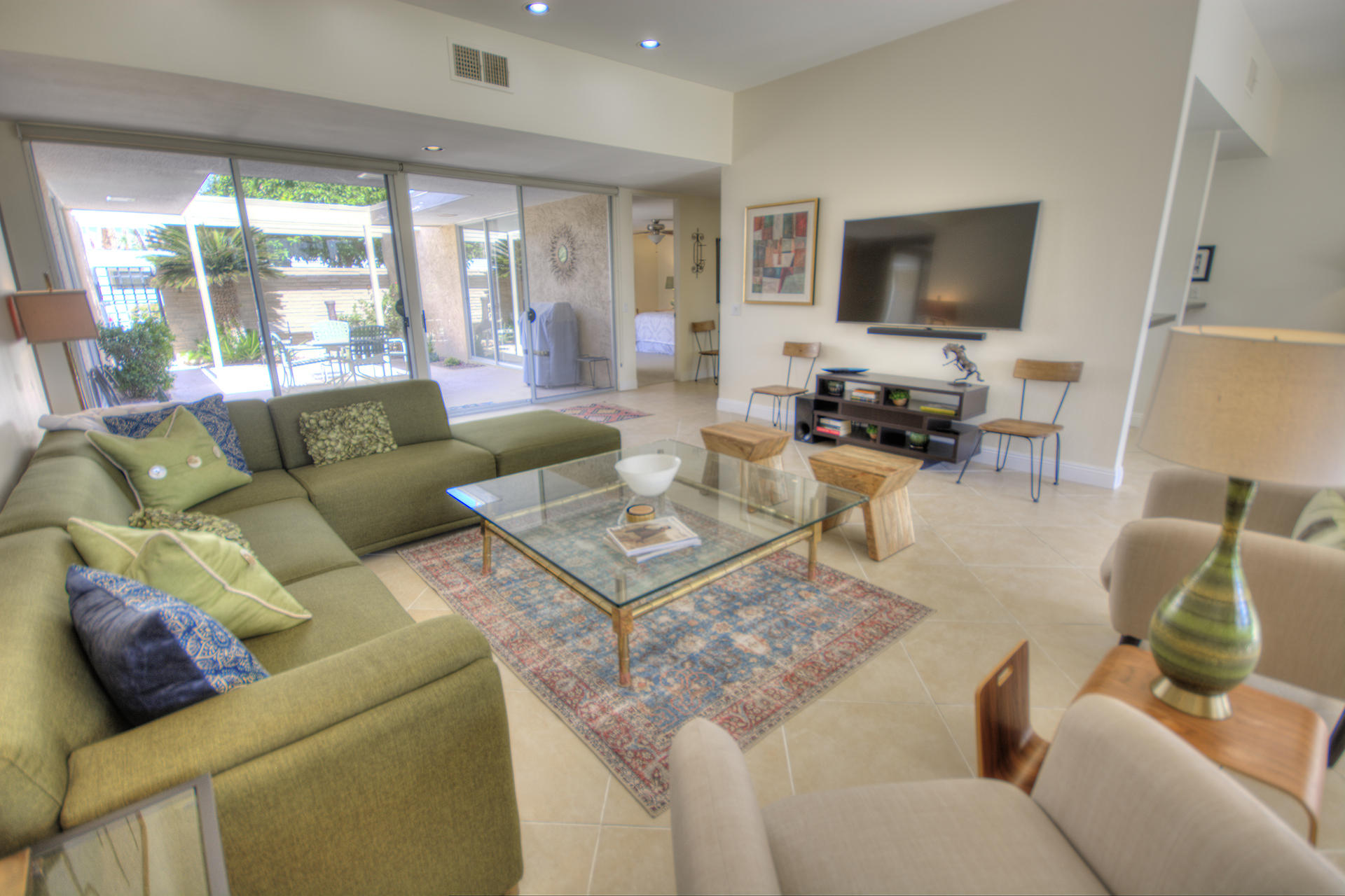 45730 Hopi Road Indian Wells, CA 92210 - Photo 6 of 42 a living room with furniture and a flat screen tv