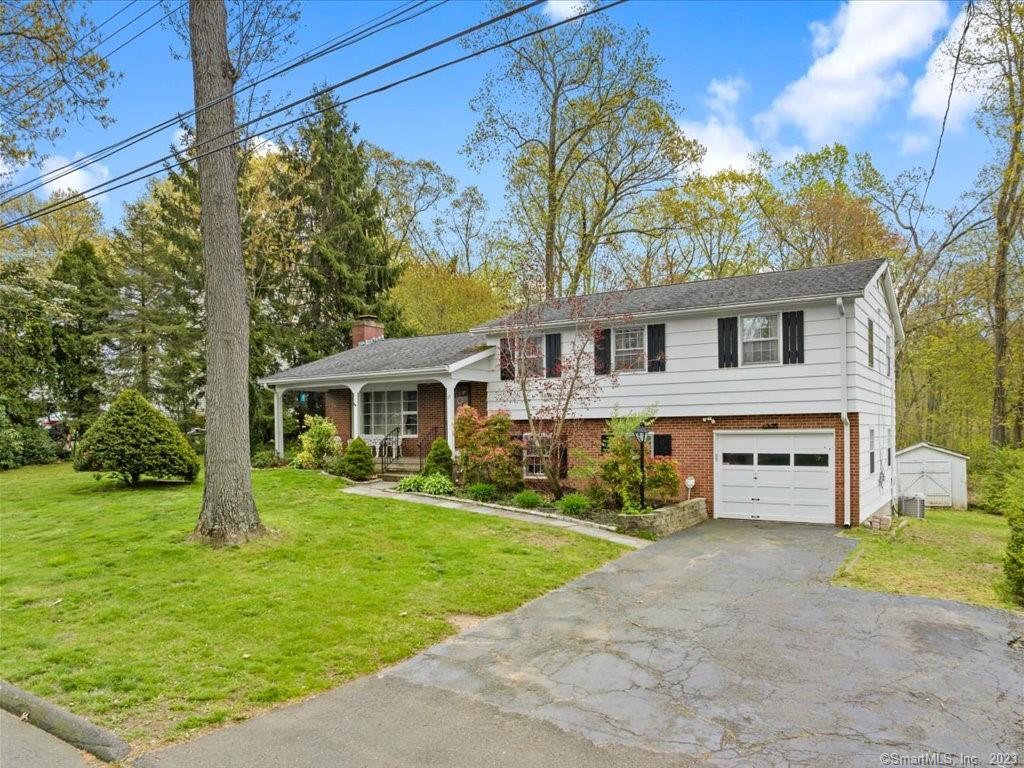 a view of a house with a garden