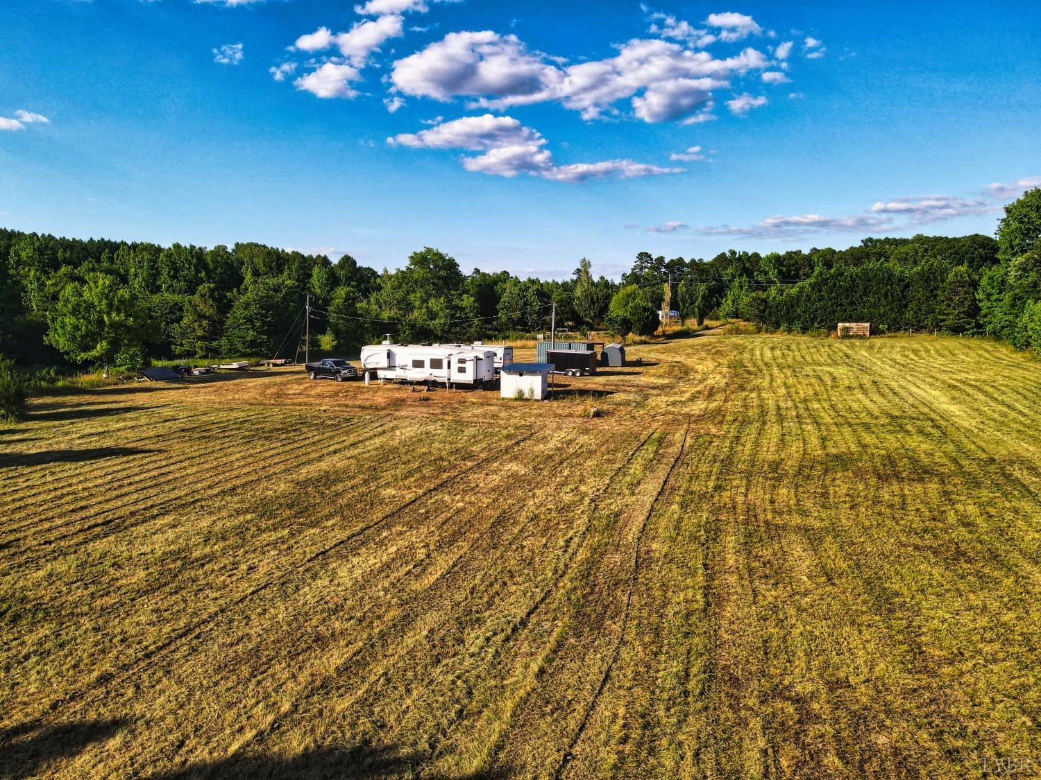 4020 Jeb Stuart Highway Red Oak, VA 23964 - Photo 15 of 48 a view of a swimming pool with an outdoor space and seating area