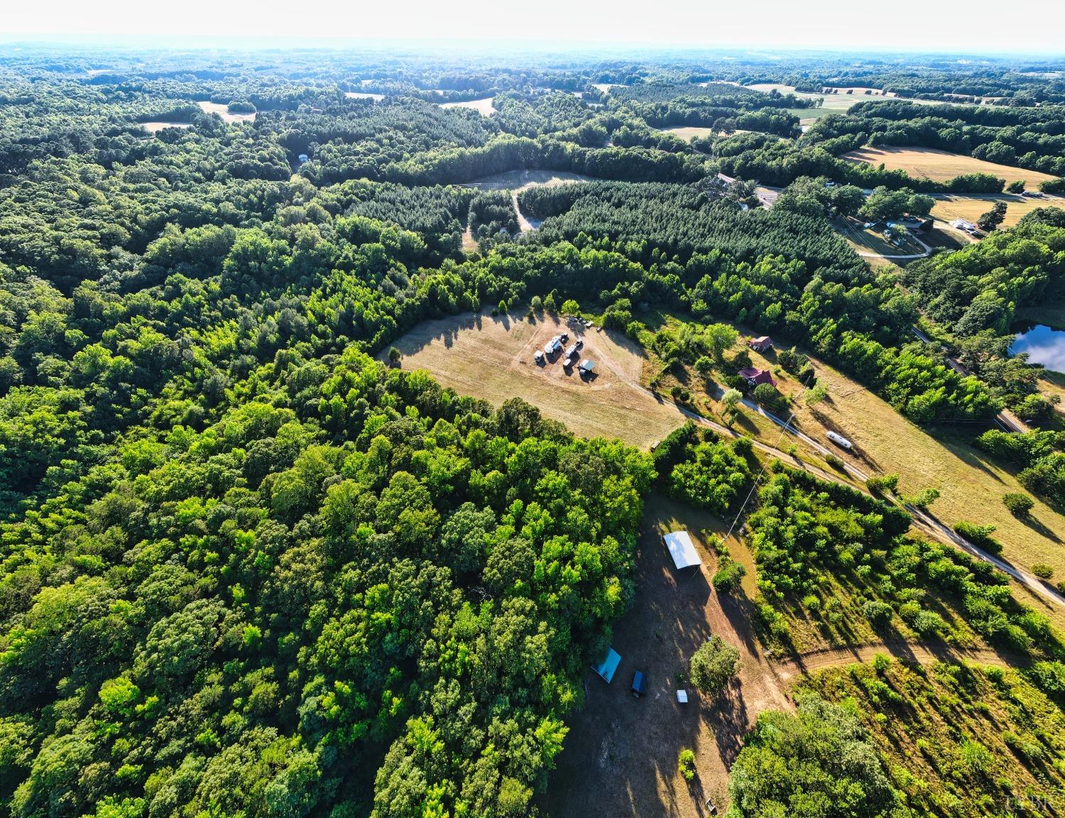 4020 Jeb Stuart Highway Red Oak, VA 23964 - Photo 18 of 48 an aerial view of a houses with a lush green hillside