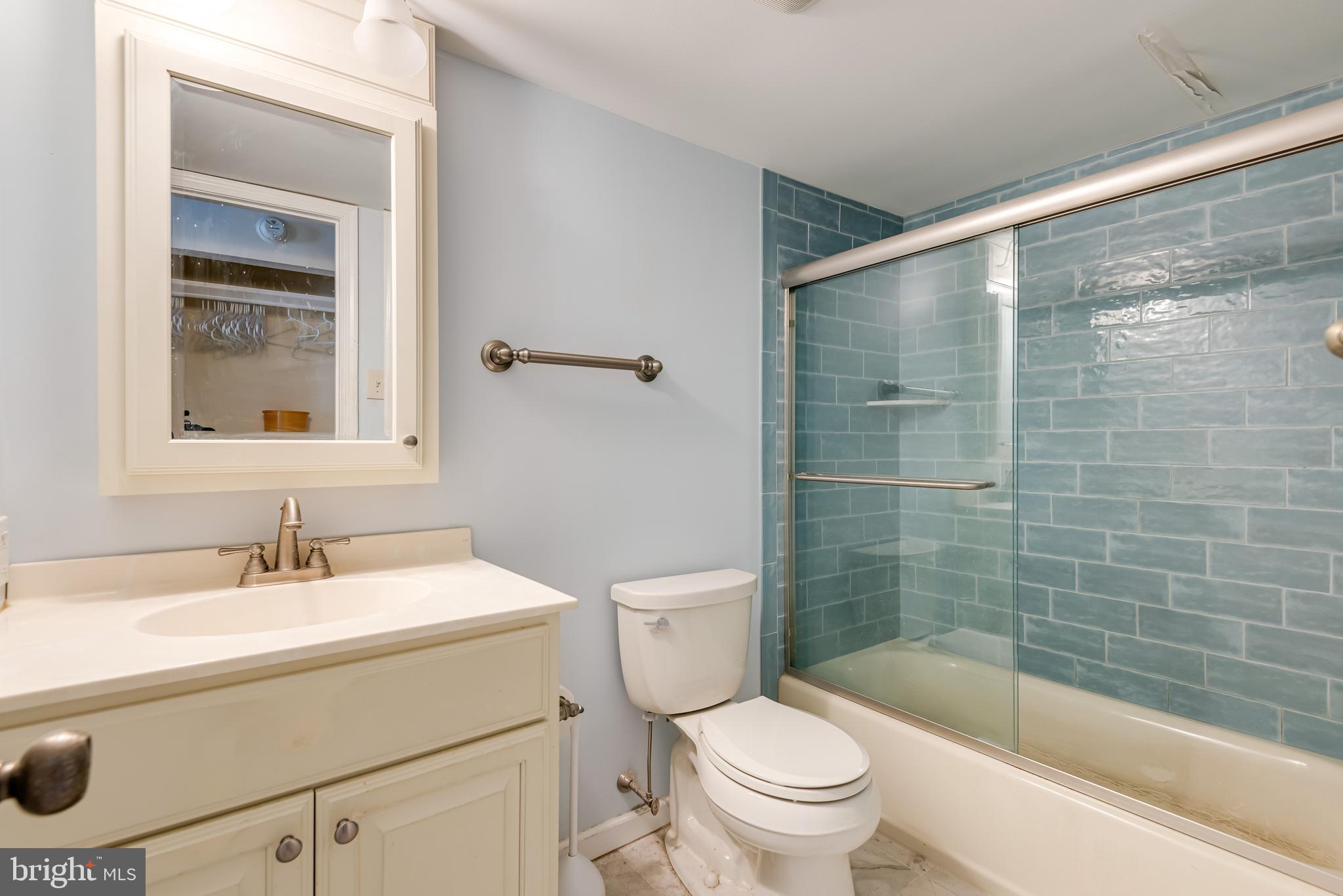 130 Riversedge Drive, Unit CONDO 130 Norristown, PA 19403 - Photo 17 of 20 a bathroom with a sink toilet and shower