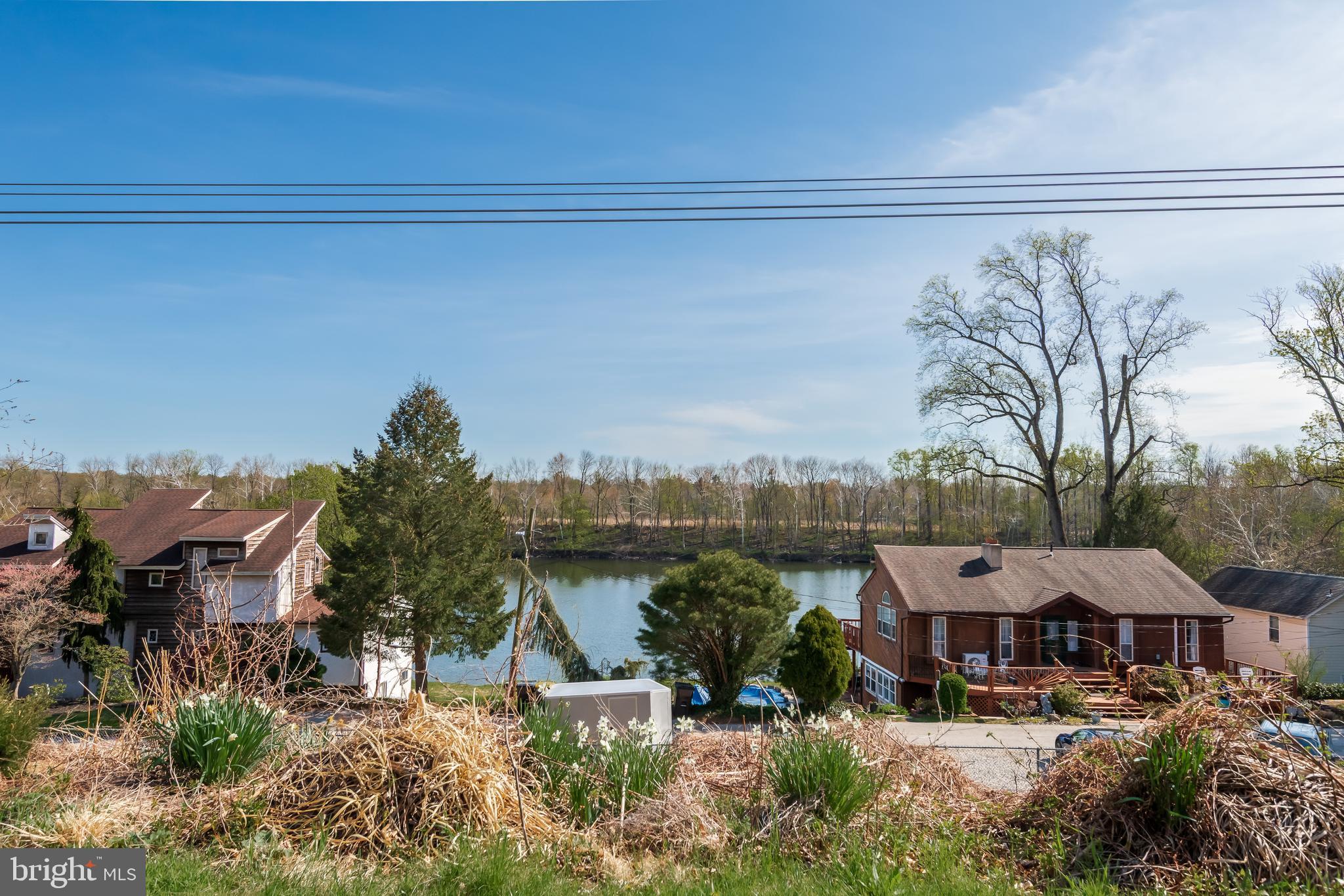 130 Riversedge Drive, Unit CONDO 130 Norristown, PA 19403 - Photo 20 of 20 a view of a lake with a outdoor space