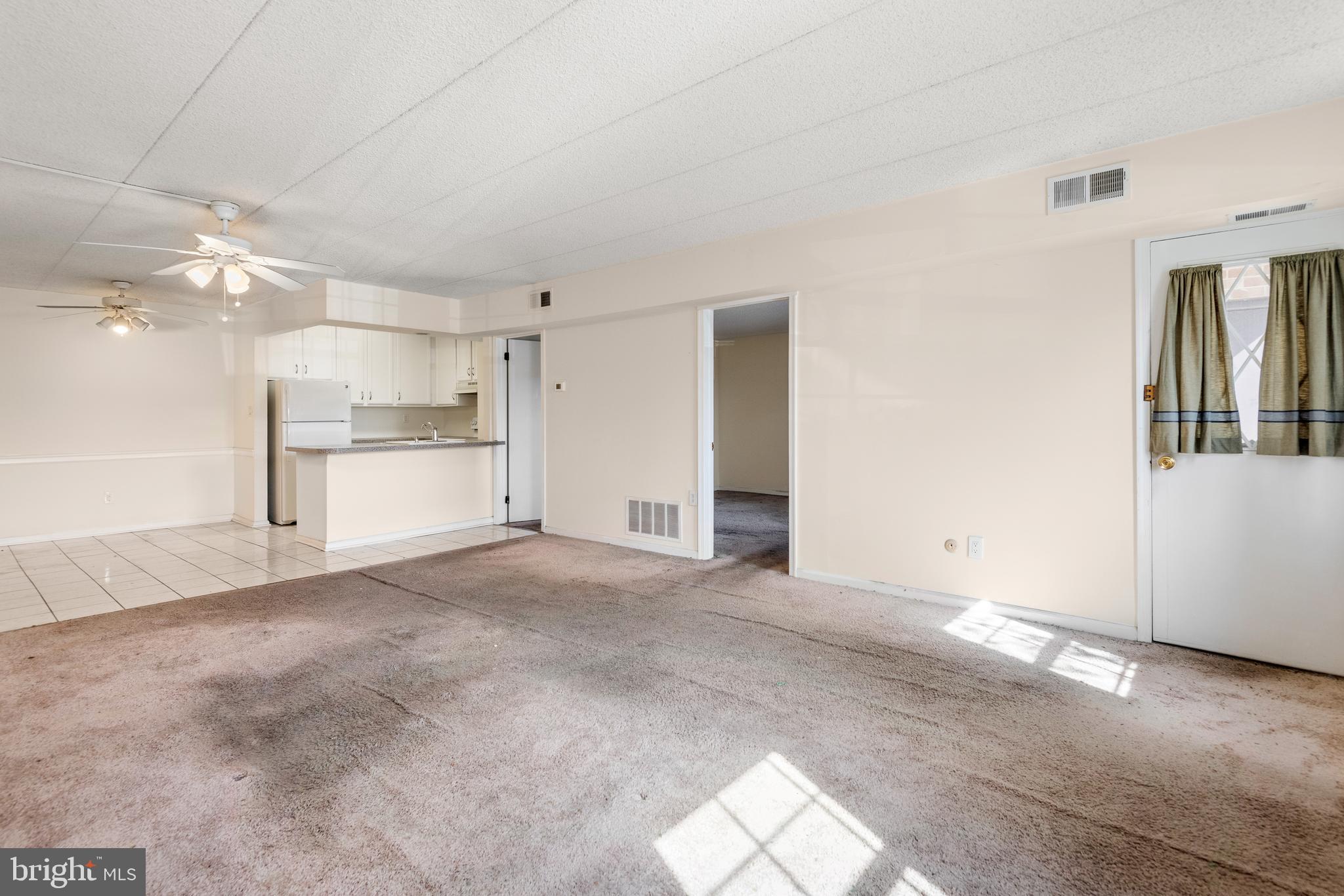 130 Riversedge Drive, Unit CONDO 130 Norristown, PA 19403 - Photo 6 of 20 a view of a kitchen with a sink and cabinets