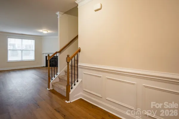a view of entryway with wooden floor
