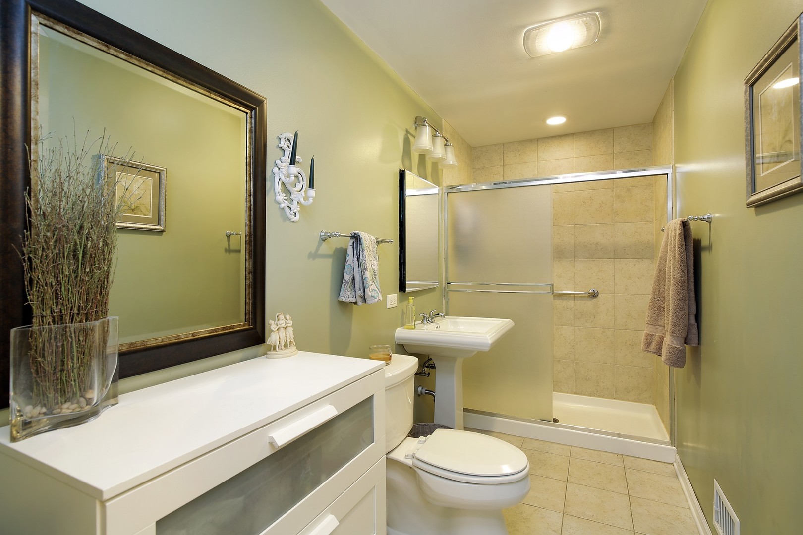 263 Riverside Drive Northfield, IL 60093 - Photo 13 of 17 a bathroom with a sink a toilet and shower