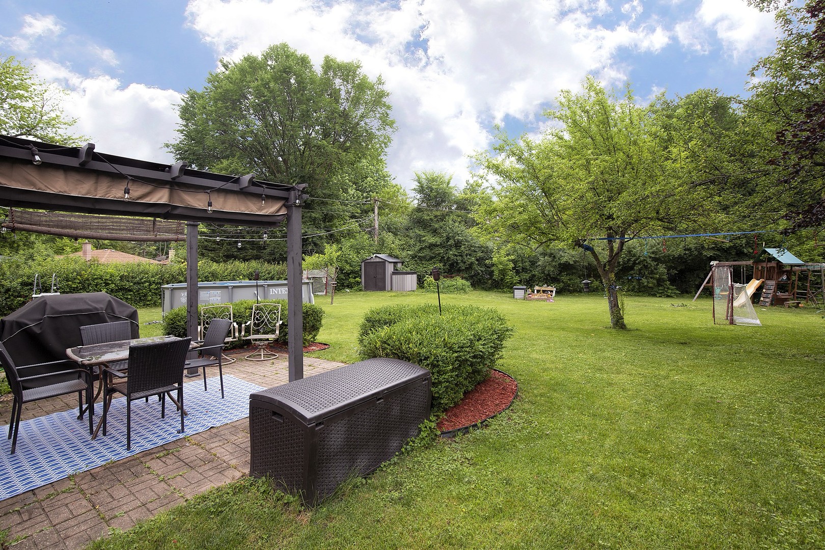 263 Riverside Drive Northfield, IL 60093 - Photo 14 of 17 a view of a garden with patio