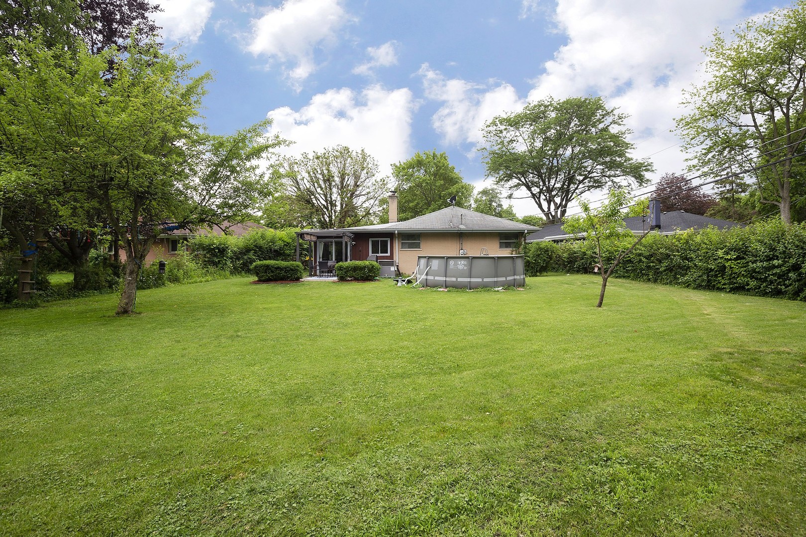263 Riverside Drive Northfield, IL 60093 - Photo 15 of 17 a view of a house with a yard