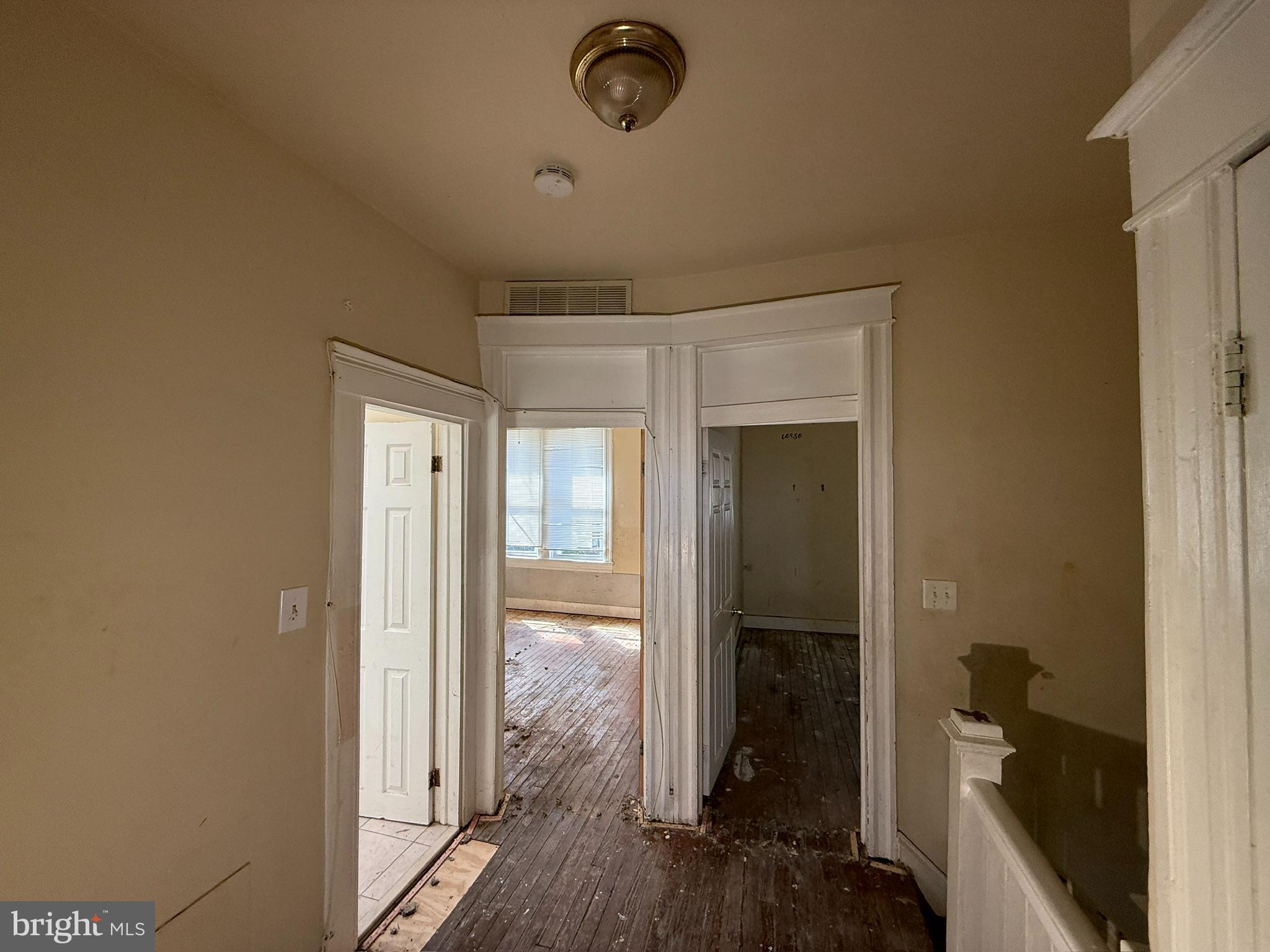 406 Edgewood Street Baltimore, MD 21229 - Photo 6 of 12 a bathroom with a glass shower door
